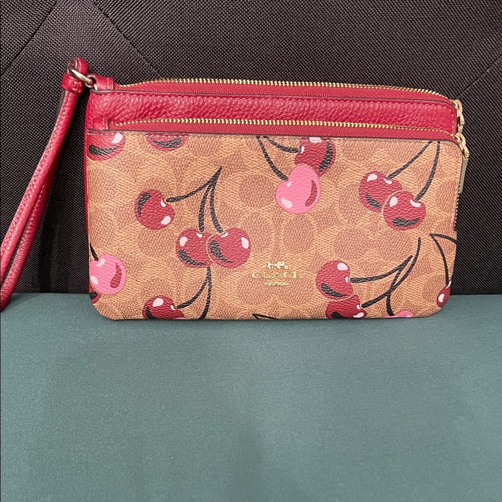 Coach Cherry Patterned Wristlet in Red and Brown